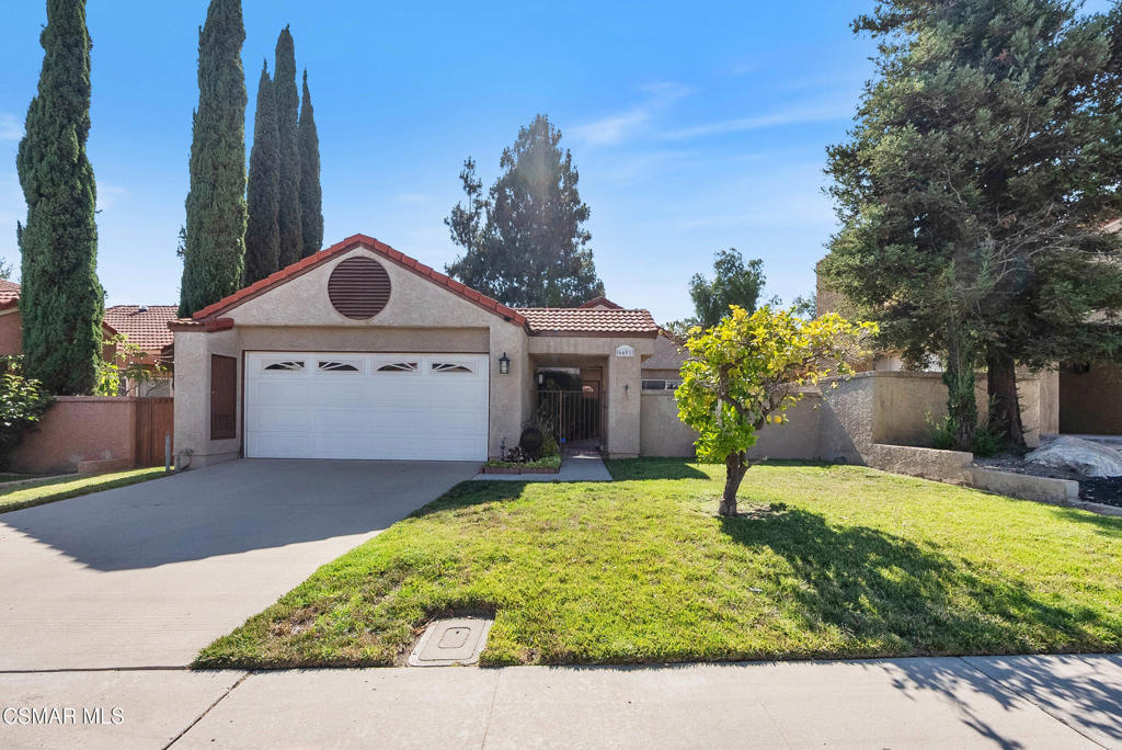 Beautifully remodeled and ideally located just steps from Moorpark College, this spacious 2-bedroom, 2-bathroom single-story home offers incredible value with no HOA or Mello-Roos and a 1% closing cost credit when using the preferred lender. Inside, you'll find an upgraded kitchen with quartz countertops, stainless steel appliances, and modern cabinetry, all flowing seamlessly into a large living room with a cozy fireplace and views of the private backyard. The home also features brand new wood-like flooring, fresh paint, a newer HVAC system, and a large attached two-car garage with extra space for storage or hobbies. A gated front courtyard adds a peaceful outdoor retreat, perfect for morning coffee or evening relaxation. Whether you're a first-time homebuyer or looking to downsize, this move-in-ready property delivers comfort, convenience, and style in a prime Moorpark location.