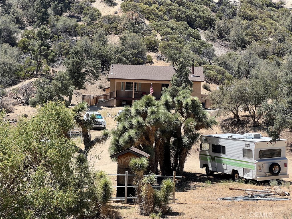 Country Ranch Retreat in Wild Horse Canyon – 4 Acres of Secluded Living.
This is off-the-grid living at its finest. Welcome to your peaceful hideaway in the heart of Wild Horse Canyon — perfectly positioned between Wrightwood and Pinon Hills. Tucked away just one mile off Highway 138, this private 4-acre horse property offers the best of serene, country living with everything you need to live comfortably.
Property Highlights:
2 Bedrooms | 1 Bathroom
Fully Renovated Interior
Cozy wood-burning stove
Tile flooring and new wood flooring in the bedrooms
On-site laundry area
2 water tanks 5000 and 1800 Gallons
Brand new appliances
3 brand new Mini-split units
Detached workshop and tact shed
Horse corral + boarding stalls – ready for your equestrian needs
Surrounded by breathtaking mountain views and unspoiled desert skies, this property is a rare opportunity for those seeking solitude, space, and a closer connection to nature. Whether you're looking to homestead, keep horses, or just escape the hustle and bustle, this ranch has it all.
Additional Features:
Just 1 mile off Highway 138 – easy access while still feeling remote
Abundant wildlife and natural beauty
Ideal for animal lovers, nature seekers, or anyone wanting to live independently