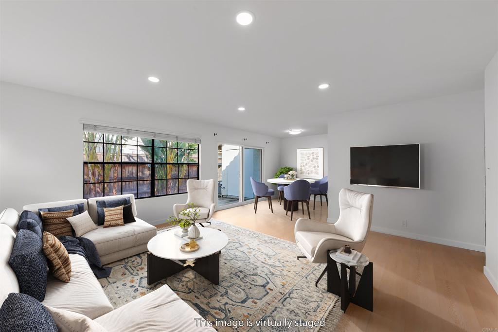 Tucked inside the gated, FHA and VA-approved Felicita Villas, this 2-bedroom, 2-bathroom end-unit is the rare blend of style, comfort, and value—now offered at $499,000, the lowest price of its kind in the community this year. Recently sold neighbors closed at $560,000 and $550,000, making this an opportunity worth grabbing. Inside, brand-new luxury vinyl plank floors run throughout a light-filled layout with upgraded wiring, recessed lighting, and full-size laundry hookups. The kitchen, refreshed with sleek countertops, clean cabinetry, and stainless steel appliances, opens effortlessly to a spacious living area and private patio—perfect for easy evenings or weekend gatherings. Both bathrooms have been reimagined with new vanities, mirrors, and lighting, while the primary suite features mirrored closets and an emerald green–tiled en-suite with glass block detail for a touch of character. With two assigned parking spaces, central HVAC, and a pet-friendly setting close to shopping, dining, and major freeways, this home checks every box for convenience and charm—without the price tag you’d expect.