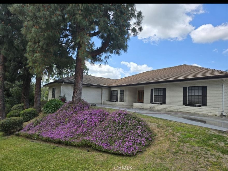 LOCATION, LOCATION, LOCATION, BEAUTIFUL REDLANDS HOME FEATURING 5 BEDROOMS AND 4 BATHROOMS. VERY DESIRABLE AREA WITH BREATHTAKING VIEWS. MASTER SUITE IS ON THE MAIN FLOOR WITH A LARGE SEPARATE WALK IN CLOSET AND LARGE DRESSING ROOM. TWO OTHER BEDROOMS ON THE MAIN FLOOR. SECOND FLOOR HAS TWO BEDROOMS THAT CONTAIN VAULTED CEILINGS COMPLETE WITH DORMER WINDOWS AND BUILT IN DRESSER'S. LARGE OPEN KITCHEN WITH WHITEWASH 10 FOOT CEDAR CEILINGS AND GRANITE COUNTER TOPS. LARGE COZY FAMILY ROOM WITH FIREPLACE AND CEDAR CEILINGS. BACK YARD LOOKS LIKE A OASIS WITH LARGE BEAUTIFUL POOL. YOU'LL FEEL LIKE YOUR ON VACATION WITH BREATHTAKING VIEWS. PAID SOLAR PANELS!! THIS HOME IS A MUST SEE. MAKE YOUR APPT!