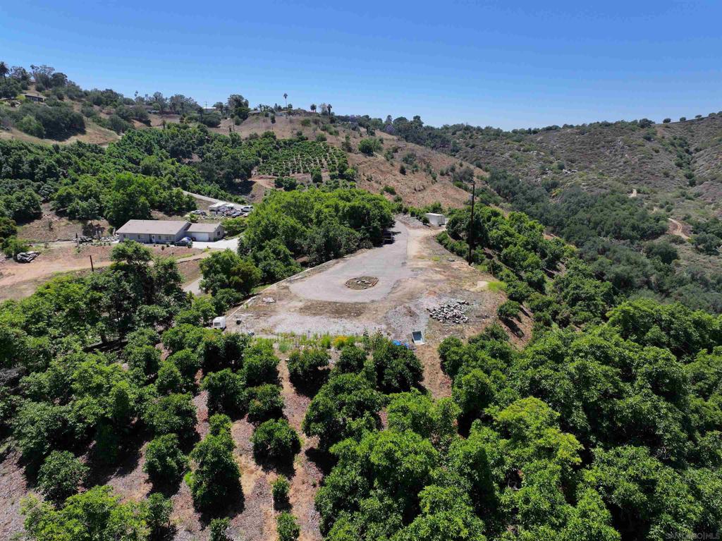 We are pleased to present 2682 Canyon Crest in beautiful Escondido. A conventionally farmed Avocado ranch consisting of approximately 32 acres, including 18 planted acres of Hass Avocados in North San Diego County, California. Situated in the prime agricultural region of Escondido, this property includes a 3" water meter, internal road system to help maximize the efficiency of farm operations, and a building pad with utilities offering an attractive element for the buyer to build their own custom estate home.
