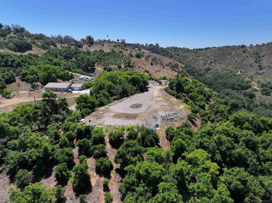 We are pleased to present 2682 Canyon Crest in beautiful Escondido. A conventionally farmed Avocado ranch consisting of approximately 32 acres, including 18 planted acres of Hass Avocados in North San Diego County, California. Situated in the prime agricultural region of Escondido, this property includes a 3" water meter, internal road system to help maximize the efficiency of farm operations, and a building pad with utilities offering an attractive element for the buyer to build their own custom estate home.
