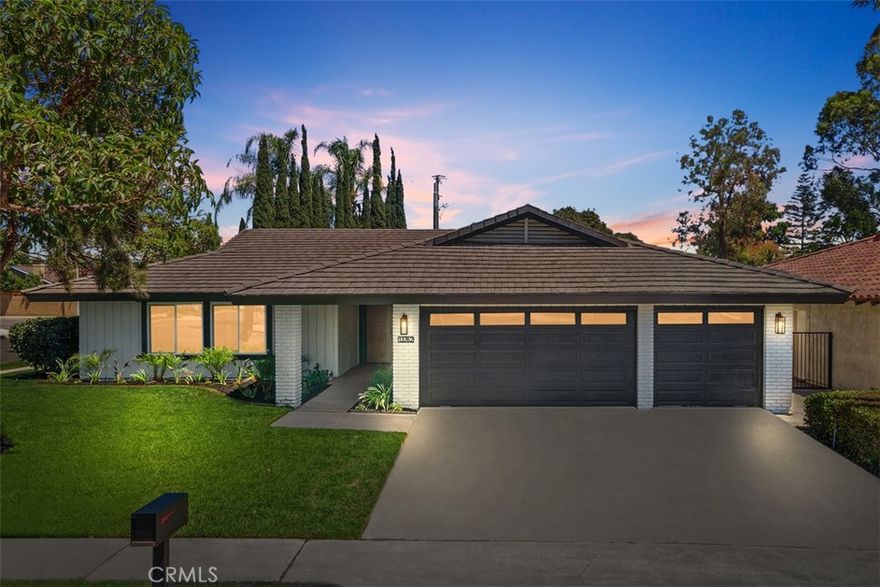 Welcome to 13762 Palace Way — a stunning single-story ranch-style pool home, beautifully reimagined with timeless design and high-end finishes. Perfectly positioned on a quiet cul-de-sac and set on an expansive nearly 10,000 SF flat lot, this residence offers the ultimate blend of comfort, sophistication, and California indoor-outdoor living. Step through the walnut double doors into 3,104 SF of thoughtfully designed living space, featuring 5 bedrooms, 2.5 bathrooms, and 2 versatile BONUS ROOMS ideal for a home office, media lounge, gym, or guest suite. An airy open-concept floor plan is bathed in natural light from abundant windows, sliders, and a skylight. At the heart of the home is the showpiece chef’s kitchen, showcasing a 36” stainless steel gas range with hood, beverage cooler, oversized center island with seating, Taj Mahal quartzite counters and backsplash, sleek White Oak cabinetry, and designer lighting. The kitchen flows seamlessly into the dining room with its cozy gas fireplace and skylight, and continues into the spacious family room — complete with a built-in bar, custom built-ins, floating shelves, quartz tops, an electric fireplace, and recessed TV niche — entertaining has never been easier. The primary suite is a true retreat, featuring elegant pendant lighting, mirrored wardrobe, and direct access to a private courtyard. The spa-inspired en-suite bathroom includes a dual-sink oak vanity, dedicated makeup station, walk-in shower with frameless glass door, and an additional mirrored wardrobe. The secondary bathroom is equally refined with a dual vanity, modern sconce lighting, and tub shower combo. Outdoors, discover your private California oasis — a newly remodeled pool, serene courtyard with fountain and fire pit, and an expansive covered patio perfect for entertaining or relaxing. Additional highlights include a 3-car garage with new epoxy floors and overhead storage, brand new AC system with smart thermostat, full PEX repipe, new dual-pane windows and sliders, new water heater, new garage door opener, and smart video doorbell. Plus, low property taxes, NO HOA, and NO Mello-Roos. This exceptional home is the perfect blend of luxury, function, and lifestyle — and truly must be experienced in person!