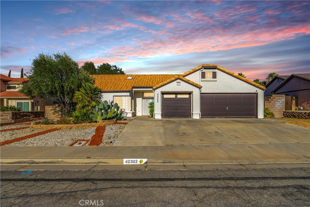 Charming, Spacious Home w/Leased Solar. Located in a lovely neighborhood, walking distance of Quartz Hill High, Joe Walker Middle School, Lane Park and the charm that is the heart of Quartz Hill, this home is the epitome of hometown life. Location aside, this is a great home with an amazing floorplan! If you are looking to start or expand your family, this 2,050sqft, 4 Bed, 3 Bath home is a must see. The lovely, low maintenance exterior is perfect for the family on the go. Inside, it is immediately clear that this home offers a space for everyone to call their own. From the foyer, you have access to the first of 2 large living spaces that could serve as a formal sitting area, that leads into the cozy breakfast nook and kitchen. From the foyer you can also proceed directly to the large family room with a beautiful gas fireplace and open sightlines to the dining area and kitchen. The kitchen boasts granite countertops & fantastic laminate flooring that runs the entirety of the home. In this kitchen, you will never feel separated from the action with sightlines to both living areas. From the living room, prepare for the bonus space that will knock your socks off! This bonus space boasts 500sqft, endless versatility & cheerful disposition with ample windows and natural light. Moving back to the foyer you will now take a right and explore the living quarters. Starting with the first bedroom and its own bath that also has access from the hall, making it great for guests. Next, the second well appointed bedroom with a Jack & Jill bath shared by the third bedroom. Last is the sizable primary suite, complete w/walk in closet, beautiful bathroom with dual vanities and the granite countertops seen throughout the home. Outside in your HUGE backyard, the possibilities abound! Again, you will enjoy low maintenance landscaping and fabulous entertaining opportunities. This home is move in and family ready, so come and see your forever home.