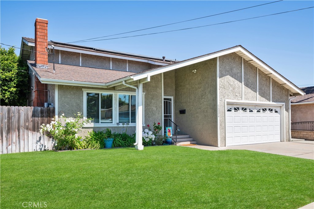 BACK ON MARKET – NO FAULT OF THE HOME! Someone else’s loss is your opportunity! Welcome to 25006 Eshelman Avenue in the quiet city of Lomita, just blocks from Palos Verdes.
This spacious residence offers OWNED SOLAR with a whole-house battery included, plus a VA assumable loan at an incredible 2.25% (terms apply—ask for details).
Step inside and discover a beautifully remodeled interior featuring fresh paint, luxury vinyl plank flooring, and plush carpet in the bedrooms. The first floor boasts a large living room with a stone fireplace and modern mantel (pre-wired for a flat-panel TV), open to the dining area and adjacent kitchen. The kitchen shines with granite countertops, stainless steel appliances, and warm shaker cabinetry, and flows into a versatile flex space—perfect as a formal dining room, second living room, or playroom.
Upstairs, you’ll find three bedrooms, including a generous primary suite, while a convenient first-floor bedroom and full bath make multigenerational living easy. In total: 4 bedrooms and 3 full bathrooms.
Enjoy Southern California living in the backyard, designed for entertaining with a sparkling pool and plenty of space for summer BBQs and gatherings. Additional upgrades include dual-pane windows and a decorative front entry with a security screen door. The full solar system will transfer to the new buyer free and clear.
Special homes like this don’t come around often—don’t miss your chance to make it yours!