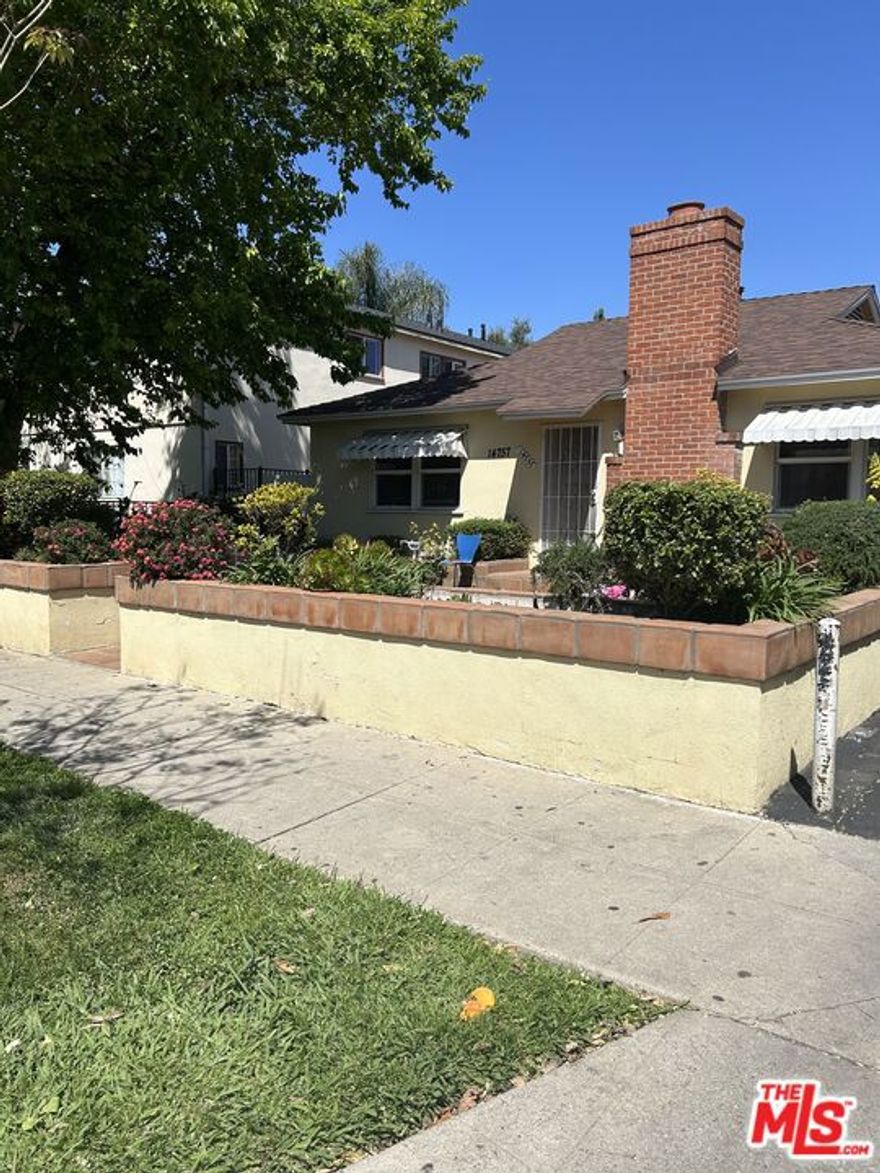 Free standing 2 bedroom one bath home with 3 one bedrooms behind it.  Large lot, well maintained property.