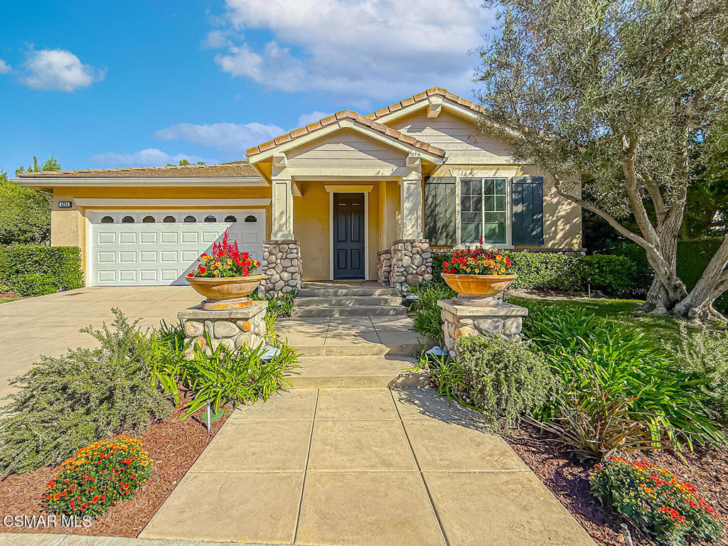 Scenic views and DOWNSTAIRS primary suite!! This beautiful former model home is located in the highly sought-after, gated community of Toscana @ Serenata in Moorpark. It is situated toward the end of a cul-de-sac, surrounded by beautiful mountain views. This home has 3 bedrooms plus an office (which could be converted into a 4th bedroom), formal living room, dining room, family room, a large kitchen and a butler's pantry with a wine fridge. The kitchen has granite countertops, stainless steel appliances--microwave, double ovens and cooktop with a hood range. The large island boasts plenty of storage space and seating area. The kitchen is open to the large family room with built-ins, a fireplace and windows for natural lighting. The huge primary bedroom suite is conveniently located on the main level featuring two large walk-in closets with custom built-in organizers, a large en-suite bathroom with an oversized shower, tub, two vanities plus a make-up vanity. Also on the first floor is a large office with two built-in desks, cabinets and shelves. The laundry room has a sink and cabinets. Two spacious bedrooms upstairs feature walk-in closets and a connecting bathroom with a private individual sink room for each bedroom. Built-in cabinets and desks are located outside the upstairs bedrooms. The backyard offers sweeping views of the surrounding hills and neighborhood. The oversized 3-car tandem garage has epoxy-coated flooring and storage area. Other features of the home include recessed lights throughout, high ceilings, dual-zone HVAC, recirculating water heater, ample storage space, built-in cabinets, and tons of upgraded finishes. Close to hiking trails, parks, shopping centers and the freeway. Don't miss the opportunity to call this place home!
