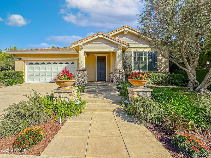 Scenic views and DOWNSTAIRS primary suite!! This beautiful former model home is located in the highly sought-after, gated community of Toscana @ Serenata in Moorpark. It is situated toward the end of a cul-de-sac, surrounded by beautiful mountain views. This home has 3 bedrooms plus an office (which could be converted into a 4th bedroom), formal living room, dining room, family room, a large kitchen and a butler's pantry with a wine fridge. The kitchen has granite countertops, stainless steel appliances--microwave, double ovens and cooktop with a hood range. The large island boasts plenty of storage space and seating area. The kitchen is open to the large family room with built-ins, a fireplace and windows for natural lighting. The huge primary bedroom suite is conveniently located on the main level featuring two large walk-in closets with custom built-in organizers, a large en-suite bathroom with an oversized shower, tub, two vanities plus a make-up vanity. Also on the first floor is a large office with two built-in desks, cabinets and shelves. The laundry room has a sink and cabinets. Two spacious bedrooms upstairs feature walk-in closets and a connecting bathroom with a private individual sink room for each bedroom. Built-in cabinets and desks are located outside the upstairs bedrooms. The backyard offers sweeping views of the surrounding hills and neighborhood. The oversized 3-car tandem garage has epoxy-coated flooring and storage area. Other features of the home include recessed lights throughout, high ceilings, dual-zone HVAC, recirculating water heater, ample storage space, built-in cabinets, and tons of upgraded finishes. Close to hiking trails, parks, shopping centers and the freeway. Don't miss the opportunity to call this place home!