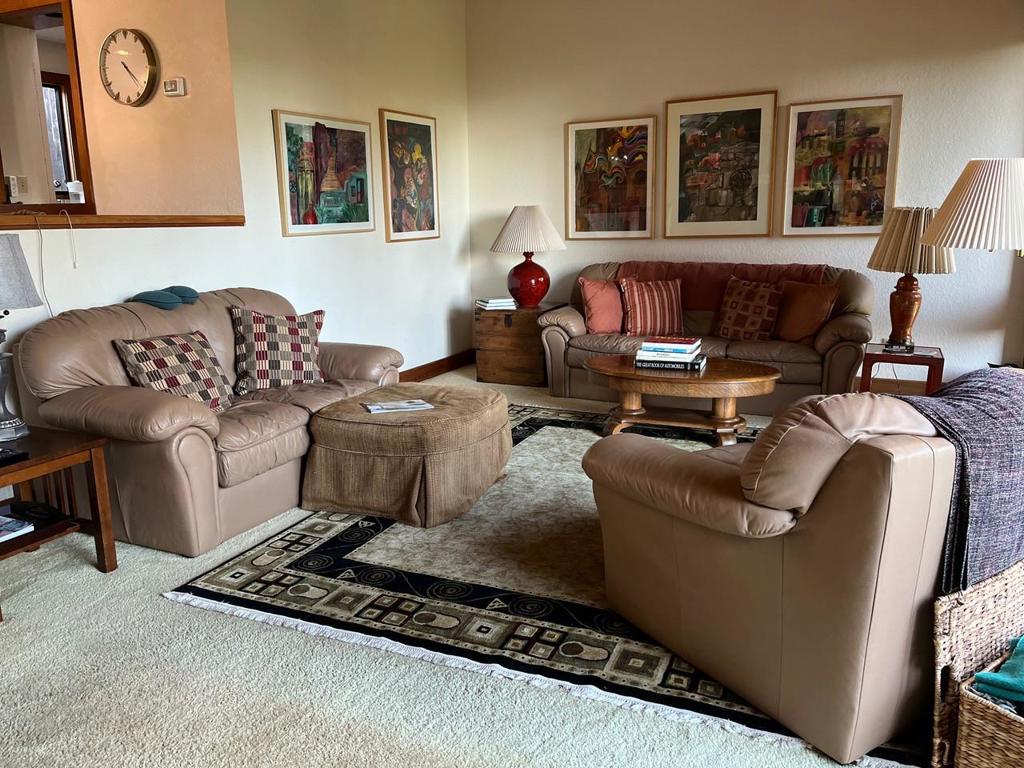 Owner is listing broker. 3 bdrm, 2 ba unit in desirable 30 unit complex. Private and wooded location convenient to downtown, shopping ctrs, beach. Some updates, flat roof and deck replaced. Some updates