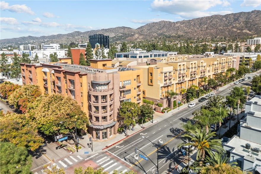 Welcome to 201 E Angeleno Avenue unit 426, a stylish dual-level loft condo at Burbank Village Walk. Perfectly situated in the heart of trendy Burbank. This prime location puts you just steps away from theaters, eateries, coffee shops, fitness studios, and everything downtown Burbank has to offer. The open-concept floor plan  with magnificent soaring ceilings and abundant light filled rooms. Kitchen overlooks the living room with breakfast bar with seating ideal for both everyday living and entertaining. Two private balconies on each floor helps blend the interior and exterior space, offering the perfect spot to relax with your morning coffee or unwind in the evening. Roof top large patio with views of Burbank and surrounding hills ideal for enjoying morning coffee or evening sunsets., truly breathtaking!  Modern finishes add a touch of sophistication throughout, creating a turnkey home in one of the most sought-after locations in Burbank Village Walk. Walk upstairs to a spacious loft that offers endless possibilities—perfect for an office, guest space, or cozy retreat and attached 3/4 bath, The tall ceilings and abundant light make this space really happy space. The townhouse is equipped with central heat and air for year-round comfort. Located in the highly sought-after Burbank Village Walk complex, residents can enjoy a range of on-site amenities including a refreshing heated pool, BBQ grills, an outdoor patio fireplace with seating, a fitness center, and 24/7 security. Just steps away from some of the best restaurants, entertainment, and the Metro Link, you’ll have everything you need at your doorstep. Don’t miss the opportunity to own this rare townhouse in Downtown Burbank.