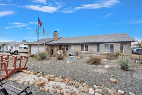 Photo of 10753 Locust Ave, Hesperia, CA 92345 (MLS # HD26038268)