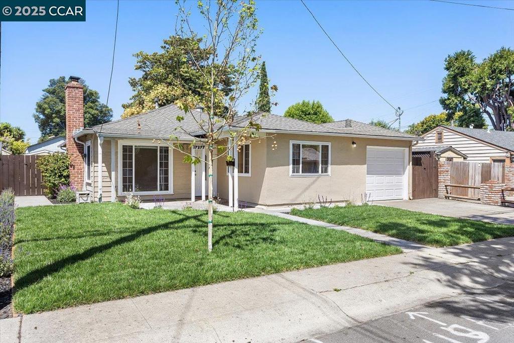 Welcome to this charming 4-bedroom, single-family home in the heart of San Lorenzo Village, spanning 1,211 square feet. This move-in-ready residence boasts an open floor plan w/ a kitchen that flows seamlessly into the living room, perfect for entertaining. Large windows flood the home w/ natural light, complementing the freshly painted interior & central heating & AC for year-round comfort. The kitchen features ample storage, generous counter space, a new dishwasher, & a skylight that enhances the bright, airy atmosphere. The living room offers a cozy fireplace w/ a mantle & recessed lighting w/ dimmers, also featured in the kitchen for customizable ambiance. The updated bathroom includes a new sink vanity w/ storage, a spacious mirrored medicine cabinet, a new light fixture, a ventilation fan, & a newly reglazed bathtub. Outside, enjoy a large backyard w/ a separate storage shed, new lawns, & landscaping in both front and back yards, plus a new automatic sprinkler and water drip system for easy maintenance. The home also includes a one-car garage w/ an automatic door opener & a washer and dryer for added convenience. Centrally located near local schools, this San Lorenzo Village gem combines modern upgrades with neighborhood charm, it an ideal place to call home.