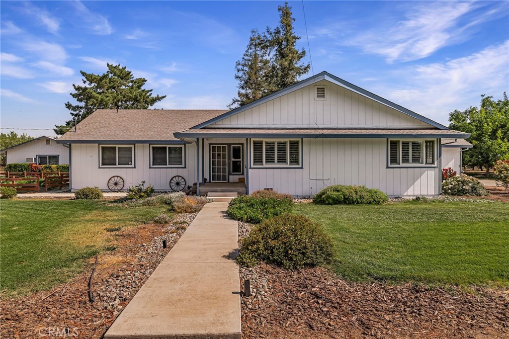 Country living at it FINEST! This one has everything you could possibly want and it is ready for a new owner… Located in the very desirable Capay area and sitting on over 8 acres – including 6 +/- acres of beautiful, income producing Chandler walnuts. The property offers privacy, comfort and plenty of room for all your hobbies and toys. The house itself is truly a place to call home – offering newer exterior paint and a newer roof as well, plus a large country kitchen that is perfect for making meals and memories with the ones that you love, a living room that will comfortably host all of your movie nights or Superbowl parties, and a family room with cozy woodstove. The bedrooms are spacious, and the bathrooms are light and bright. The expansive back porch and deck take in views of the orchard and will quickly become your favorite spot to have morning coffee or to relax after a long day… In addition to the wonderful home, this property also offers an detached garage that has been transformed into an amazing “man cave” with its own heat and cooling as well as television hook ups and perfect décor…. Every great property needs a shop to store equipment and to get projects done, and this has one that is to die for! Measuring 30’ X 40’ with two large roll-up doors a full bath and an additional loft for storage – it is truly the perfect workspace for all of your needs. There is also a wonderful family orchard that will allow you to enjoy a wide variety of beautiful fruit - including apples, nectarines, plums, Asian pears, persimmons, pomegranates and multiple types of citrus as well! In addition, there is a large 30’ X 30’ covered RV or camper storage as well. To round out the countless amenities, the property is powered by a fantastic solar array to help keep utility costs low. If having a place of your own in the country has always been your dream, there could be no better place to help check that off your list!