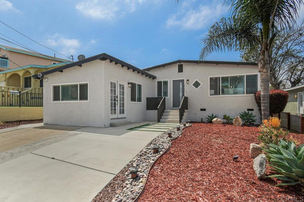 Welcome to this stunning, move-in-ready 3-bedroom, 2-bathroom home in the heart of San Diego! Thoughtfully renovated from top to bottom, this single-family residence features a newer roof, dual-pane vinyl windows, luxury vinyl plank flooring, newer interior and exterior paint, and beautifully updated tilework. The sleek, modern kitchen is a chef’s dream with quartz countertops, newer soft-close cabinets, and a full suite of stainless steel appliances—including a Samsung gas range with built-in air fryer and WiFi connectivity. Recessed lighting adds a warm ambiance throughout the home. Enjoy breathtaking ocean views right from the primary bedroom, and take in panoramic sights of Point Loma and the Coronado Bridge from the expansive backyard. With a flat, usable lot perfect for entertaining, drought-tolerant landscaping, the outdoor space offers both beauty and functionality. Don’t miss this rare opportunity to own a truly turnkey home in a prime San Diego location!