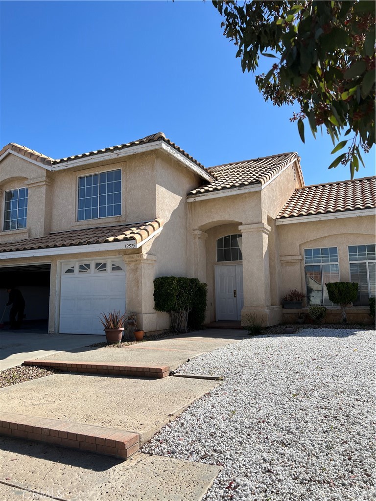 This home is a beauty. Inground Pool and Pool service included. Summer Fun. all upgraded, Beachy Vibe, Gray plank flooring. Large open floor plan, central kitchen, dining on one side of the Kitchen and family room on the other side. Living room area. Laundry room and 1/2 bath downstairs, 3 bedrooms and the office upstairs. All done in pretty gray tones. The family room has Large windows and slider out to Patio and pool area. There are stairs outdoors leading up to Master Bedroom balcony. Very light and bright through-out. Low Maintenance front landscaping, terraced steps leading up to front door.