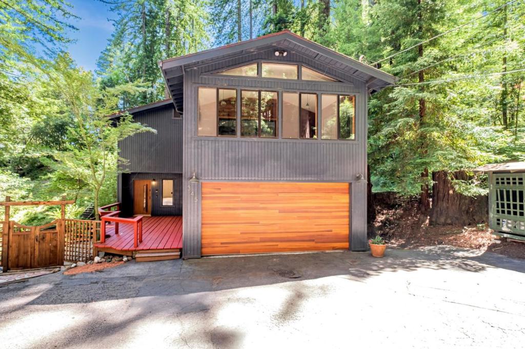 BEAUTIFUL TURN KEY CUSTOM HOME. Excellent Commuter Location to the Bay Area and Silicon Valley. Google, Facebook, HP, Oracle, Tesla, and Santa Clara County Companies, ONLY a 40 Minute Drive. Live in the Forest and Drive to the City! AMAZING Kitchen, featuring Deluxe Gas Range with Dual Ovens and with the Warmer oven, Corian Countertops, Beautiful Flooring. This Custom Home features High Ceilings, Gas Fireplace, Open Style Living, Spacious Bedrooms, and Sunroom off the Living Area along with Deck off the Kitchen. Private and Secluded over an Acre of property, Hike, Garden, or Just Be! Wonderfully Fabulous, you will not want to leave! There are 2 Master Bedroom Suites on the Ground Floor with Walk in Closets, and One Bedroom Upstairs. This Custom Home also has Generac Generator wired to start immediately if there is a Power Outage. Plenty of Parking, RV, Boat, Carport and Two Car Garage. 5 Minutes to Town and 40 Minutes to Silicon Valley. HOUSE IS VIRTUALLY STAGED.