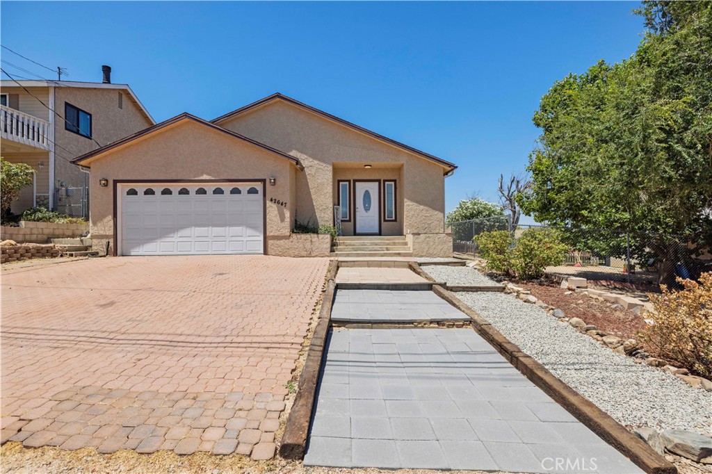 Welcome to this single-story 3 bedroom, 2 bathroom home tucked away in Lake Hughes—just 20 miles from Santa Clarita. With no rear neighbors and breathtaking mountain views right in your backyard. Step outside and find yourself immersed in the beauty of the mountains—it’s like having your own private trail system right out the back door. Inside, you’ll love the open layout that flows effortlessly from the spacious living area to the kitchen and dining space, making it ideal for entertaining or simply relaxing at home. The garage is just as impressive, featuring epoxy flooring and taller ceilings. Whether you’re sipping coffee on the patio or cozying up indoors, this home brings the outside in and lets you live the mountain lifestyle—without being too far from the city.