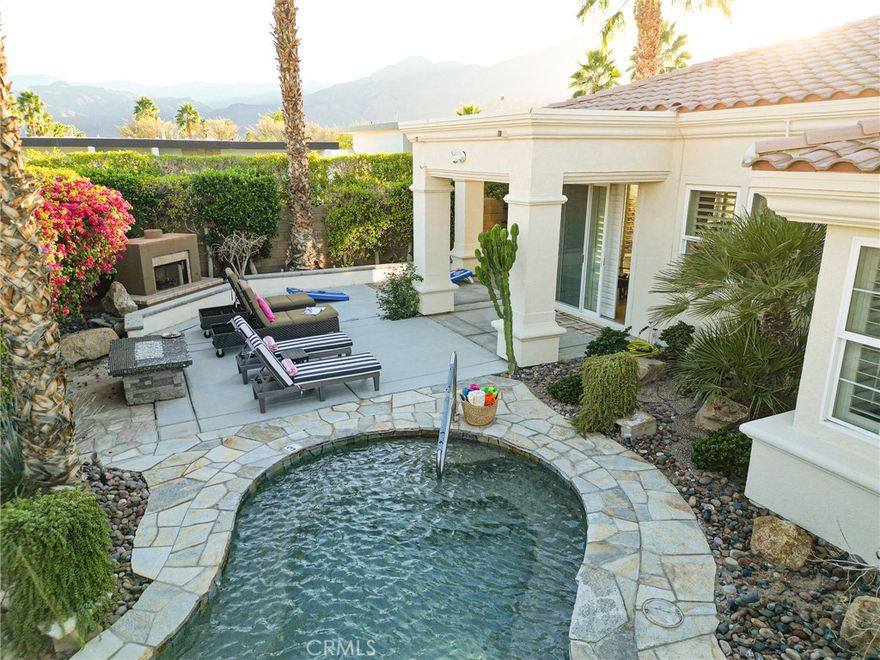 Fantastic opportunity in one of La Quinta's most sought after neighborhoods! Ideally positioned in Puerta Azul's most desired location, this beautiful turnkey home features a private spa/pool in the spacious and private south-facing backyard with outdoor fireplace and mountain views. Inside, one will enjoy the well thought-out floorplan with high ceilings throughout, an inviting great room with fireplace which opens seamlessly to the backyard for effortless entertaining with family and friends as well as a powder bathroom located off of the entry. In addition, there are two primary suites with each having their own bathroom and one which opens to a beautiful, secluded patio area perfect for morning coffee. There is also a one car garage with direct home access. Puerta Azul is a gated, exceptionally well maintained community with reasonable HOA dues featuring two resort-style pools, tennis court, bocce ball area as well as a fantastic clubhouse with a beautiful fitness center. Furthermore, Puerta Azul is one of the very few communities in the city of La Quinta which allows for short-term rentals with no nightly minimum, allowing homeowners to capitalize on its exceptional location. Puerta Azul is located just minutes to world-class golf and tournaments at PGA West, fine dining and shopping at Old Town La Quinta, the Empire Polo Club where the Coachella and Stagecoach festivals are held in addition to some of the most prestigious golf clubs in the entire Coachella Valley. This home has been a successful short term rental with future bookings scheduled that can be seamlessly transferred to the new homeowner. Whether you are looking for a fully furnished seasonal desert retreat, investment opportunity or perhaps both, this exceptional property offers it all!