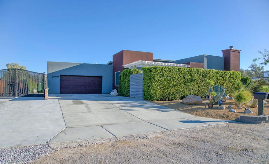 Beautifully Maintained Desert RetreatThis pristine 4-bedroom, 2 bath home offers a perfect blend of comfort, style, and convenience. Featuring an open floor plan, formal dining area, and direct access to a private courtyard, the layout is ideal for both everyday living and entertaining. The oversized garage provides ample space for vehicles and storage, while the stunning backyard is designed for relaxation and outdoor enjoyment. Located just minutes from Palm Springs and Joshua Tree National Park, this home offers the best of desert living - close to shopping, dining and more.
