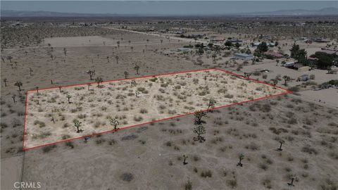 Photo of 4 Peral Road, Phelan, CA 92371 (MLS # HD25129522) Photo of 4 Peral Road, Phelan, CA 92371 (MLS # HD25129522)