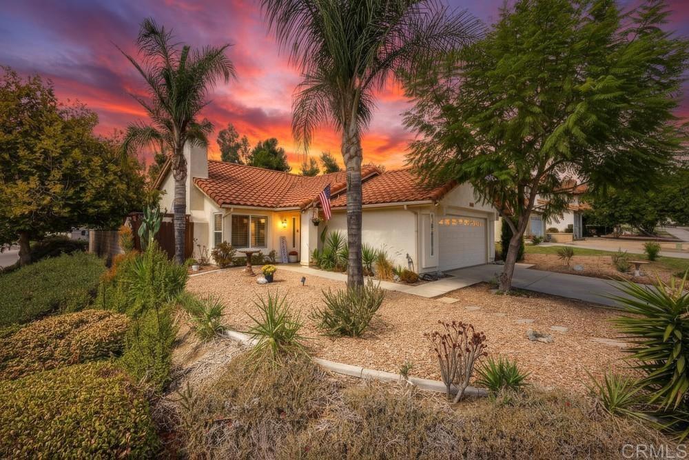 Rare single story home in low tax area! Interest rate Lender buydown at no cost for first year savings! Tucked on a quiet cul-de-sac in one of Murrieta’s lowest-tax areas, this single-story corner-lot home has been positioned for comfort, efficiency, and easy everyday living. The open layout welcomes you with vaulted ceilings and a cozy fireplace that anchors the living space. Hardwood floors flow seamlessly through the living spaces, adding both charm and practicality. Natural light filters through plantation shutters, creating a warm, inviting atmosphere that adapts beautifully from morning to evening. The remodeled kitchen shines with quartz counters, stainless-steel appliances, custom tile flooring, and an island that makes cooking and gathering effortless. Step outside to discover a peaceful, private backyard framed by mature landscaping and tall block walls. Relax in the spa, enjoy the covered patio, or tend your raised garden boxes—your own little oasis in the heart of Murrieta. Recent upgrades include leased solar for energy savings, R38 attic insulation for improved efficiency, a 2023 roof inspection with all corrections completed, an HVAC tune-up with thermostat rewiring, a Nuvia Signature water softener, smart-lock entry, and perimeter cameras for added peace of mind. With no HOA, low property taxes, and convenient access to the new Murrieta Costco, Super Target, great schools, freeways, and walking trails, this home offers a perfect blend of privacy, practicality, and value—ready for its next chapter.