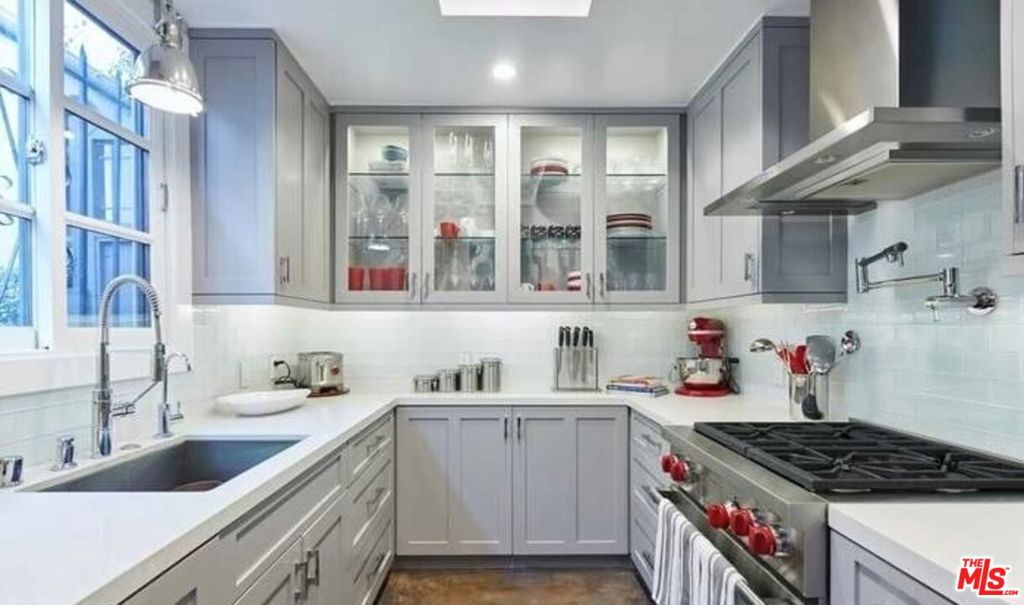 Location - Location - Location. Welcome to this 2-bedroom, 1 bathroom townhome in a small French style boutique 6-unit complex in an ideal West Hollywood location. Recent renovations include a new kitchen with high-end appliances including Thermador refrigerator & dishwasher, built in coffee/espresso machine, Wolf Range/Oven, Sub-Zero wine fridge, new cabinetry, Caesarstone counter tops and polished concrete floors. The luxurious bath has been remodeled with high-end tile and flooring, frameless glass enclosure, rain shower and a remotely opened skylight. Primary bedroom includes high ceilings and a huge walk-in closet. Other features include a light-filled terrace on the third level that has been converted to a full gym with an infrared sauna. There is a wood burning/gas fireplace in the living room, new HVAC system, extra storage and one covered parking space. Steps to Beverly Hills and walking distance (walk score of 86) to all that West Hollywood has to offer.