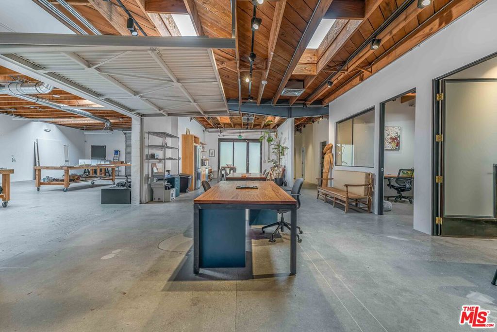 1605 E 1st St is a fully renovated turnkey creative office/art studio space in Downtown LA. The building offers a generous building-to-land ratio for DTLA standards, 3,698 square foot building sitting on 6,908 square feet of land. The building underwent a full remodel totaling over $700,000 recently, making it an elegant turnkey space for an Owner User. Its extensive tenant improvement facelift was completed just prior the exponential and dramatic costs of materials. The high-end renovations included: new electrical, plumbing, HVAC, roof, alarm system, skylights, ramp/handrail, electric gate, windows/doors, bathroom and light fixtures, exterior lighting, and a custom kitchen installation. The property features two private offices, a spacious conference room, a ventilated art studio, two bathrooms, storage, a 10'x10' roll up door, and gated parking with a total of seven spaces. With its versatile layout, the subject property is ideal for a wide range of artistic Owner-Users seeking an adaptable workspace.