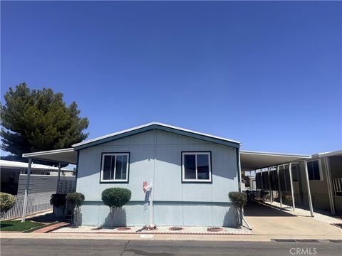 Photo of 13393 Mariposa Rd. RD #50, Victorville, CA 92395 (MLS # HD26101645)