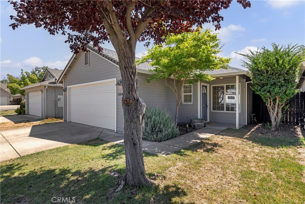 Simple, practical, and just the right amount of charm. This well-maintained home offers all the essentials without the fuss. The open layout gives a comfortable flow, with vaulted ceilings and durable vinyl plank flooring that make everyday living easy. The kitchen features plenty of storage and a bar-top counter, and painted Kitchen cabinets that still look crisp and modern. Step out back to a covered patio and pergola area, an inviting spot for evening hangouts around the fire pit, and a low-maintenance yard that includes concrete side yards! With previous updates throughout, including bathroom flooring, cabinet refresh, exterior paint, and energy-efficient solar, this home is ready for its next chapter. This home is move-in ready and full of personality! Come see for yourself—this gem won't last long!