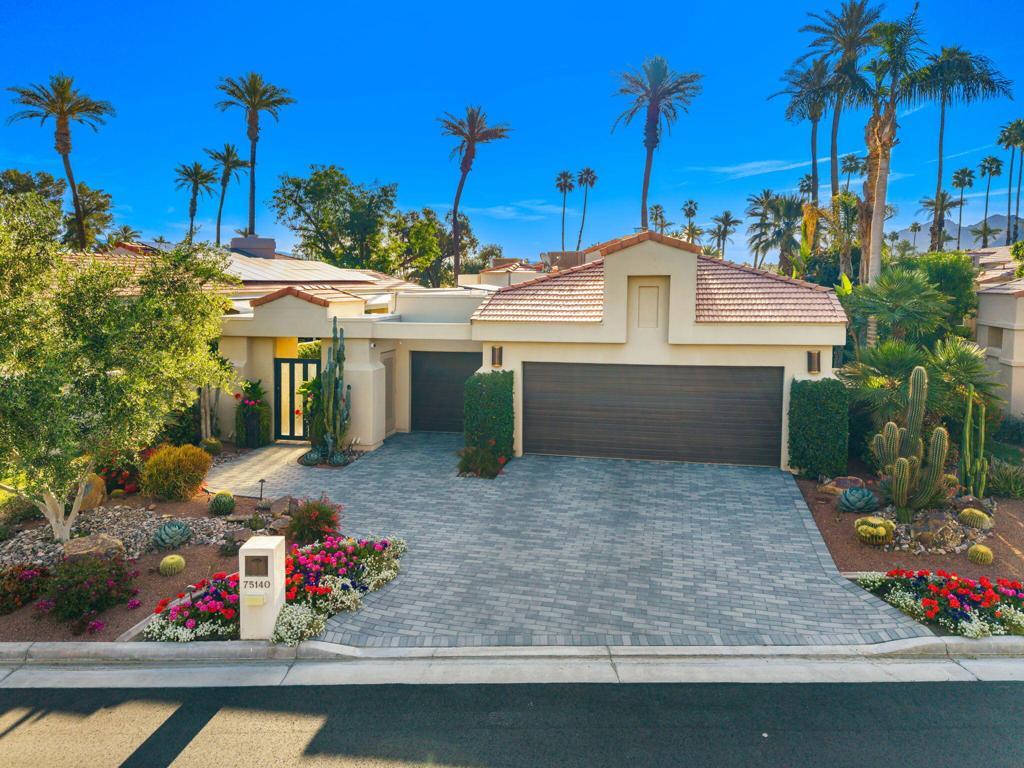 Experience the perfect blend of sophistication, comfort, and resort-style living in this dramatically detailed and uniquely upgraded golf course home, set directly on the lush green fairway with breathtaking mountain views as your backdrop. From the moment you enter, the home reveals its charm with custom-quality finishes, warm desert tones, and thoughtful design touches that showcase the artful use of stone, granite, and tile.The heart of the home is an expansive great room, featuring soaring ceilings, walls of glass, and a stately fireplace that creates a dramatic focal point. Natural light pours in through oversized picture windows, seamlessly merging the indoors with the striking outdoor vistas. Tile flooring glistens underfoot, complementing the open layout and enhancing the sense of space and flow.A true gourmet kitchen awaits the discerning chef, complete with stainless steel appliances, richly crafted wood cabinetry, and abundant counter space ideal for both everyday living and hosting gatherings. Whether preparing a casual meal or entertaining in style, this kitchen is designed to impress.The master suite offers a private retreat, highlighted by a spacious walk-in closet and a spa-style bath that rivals a luxury resort. Large sliders and windows frame the sweeping views, creating a sense of peace and escape. Additional guest rooms are equally inviting, making this home as practical as it is beautiful.Step outside to discover an entertainer's dream patio where mountain and fairway views provide the ultimate setting. A sparkling pool and spa invite relaxation, while dramatic landscape lighting transforms the evenings into a romantic desert experience. Here, you'll savor quiet mornings, vibrant sunsets, and the cool desert nights that make Indian Wells living so desirable.Every detail of this immaculate home reflects quality and sophistication, while its location on the fairway ensures both privacy and a connection to the beauty of the Coachella Valley. This is more than a home--it's a lifestyle.