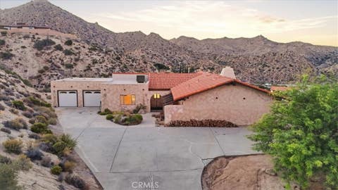 Photo of 54026 Ridge Rd RD, Yucca Valley, CA 92284 (MLS # DW26150053)