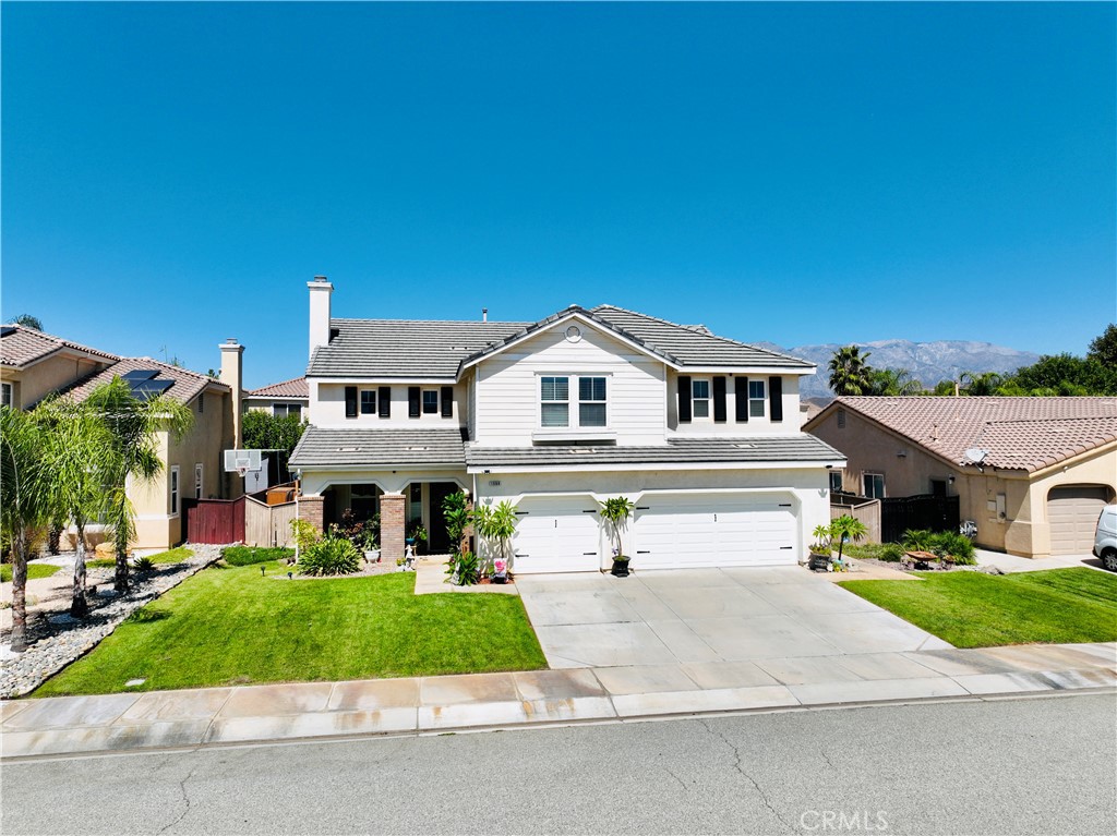Welcome to this spacious two-story residence offering 4 bedrooms, 3 bathrooms, and a versatile bonus room across approximately 3,246 sq. ft. of living space. A covered porch entry opens to a bright living room with vaulted ceilings and a fireplace, creating a warm and inviting atmosphere.
The main level features a formal dining area, a guest bedroom with a full bath, and a well-appointed kitchen highlighted by granite countertops, a center island with breakfast bar seating, and upgraded cabinetry designed for both everyday living and entertaining.
Upstairs, a generous loft provides flexible space for an entertainment room, lounge, or play area. The private primary suite showcases mountain views, dual closets, and an ensuite bath with dual sinks, a soaking tub, and a separate shower. Two additional bedrooms, a full bathroom, and a conveniently located laundry room complete the second floor.
