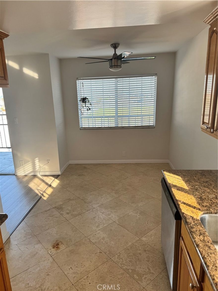 Very nice large 2 bedroom with balcony and big view of harbor.   Laundry in unit.   No carpet at all, updated kitchen and baths.  Comes with one side of a shared 2 car garage.  Unit is up one flight of stairs in small builiding.  Available now.  This is a single level unit however there is a flight of stairs to go up to get there.