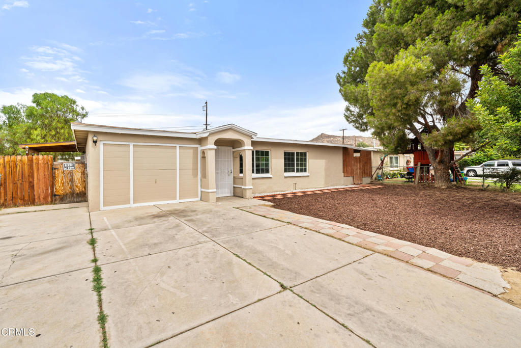 Welcome to 10357 Bonita Avenue, a single-story home located in Riverside. This residence features 3 bedrooms and 2 bathrooms with approximately 1,010 square feet of living space on a 7,841 square foot lot, as per public records. Built in 1959, the home offers a functional floor plan that includes a living room, kitchen, and an indoor laundry area. The lot provides usable outdoor space in both the front and back, suitable for a variety of needs. Parking accommodations include an attached garage and carport, offering a total of 2 spaces. Additional highlights include mountain views and a location within a neighborhood with no HOA. The property is situated within the Alvord Unified School District and is conveniently located near local schools, shopping centers, and dining establishments. With nearby freeway access, commuting to surrounding areas is straightforward and accessible. This home provides an excellent opportunity for buyers seeking a single-family residence in Riverside with a practical layout and convenient location.