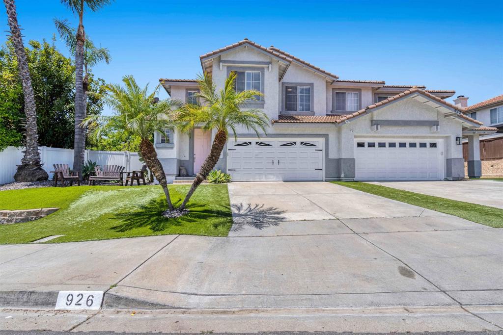 Located in the desirable Rancho Del Rey community, this Twinhome offers over 1,800 sq. ft. of living space with 4 bedrooms and 2.5 bathrooms. The private backyard features vinyl fencing, low-maintenance synthetic turf in both the front and back yards, and a built-in BBQ area with a fire pit, ideal for outdoor entertaining. Inside, the main living area includes a cozy fireplace and stainless steel appliances, including a new stove and microwave. The floor plan connects the kitchen, dining, and living spaces, offering a practical layout for daily living. Upstairs, the laundry room adds convenience, and all bedrooms are generously sized. The home also includes wood flooring that can be sanded, stained, and restored to your personal style. Additional highlights include an attached two-car garage, driveway parking, and plenty of street parking. Ideally located near elementary schools, Rancho Del Rey Middle School, and just a short drive to Bonita Vista High School and Southwestern College. With nearby parks, shopping centers, and restaurants. And with no HOA or Mello-Roos fees, this home offers exceptional value in a sought-after neighborhood.