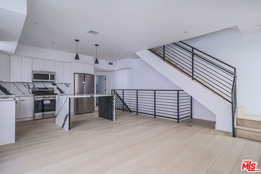 Be the first to live in this brand-new 3-bedroom, 3-bath home at 11812 Gilmore Ave, located in the heart of North Hollywood. This modern residence features open-concept living spaces, a stylish kitchen with a spacious granite island, and expansive windows that fill the home with natural light. Enjoy a spacious private rooftop deck,  assigned parking, and generously sized bedrooms designed for comfort and ease. With two convenient parking spaces and a prime location near the NoHo Arts District, Universal Studios, Burbank, and major freeways, this home offers the ideal balance of style, comfort, and city convenience.