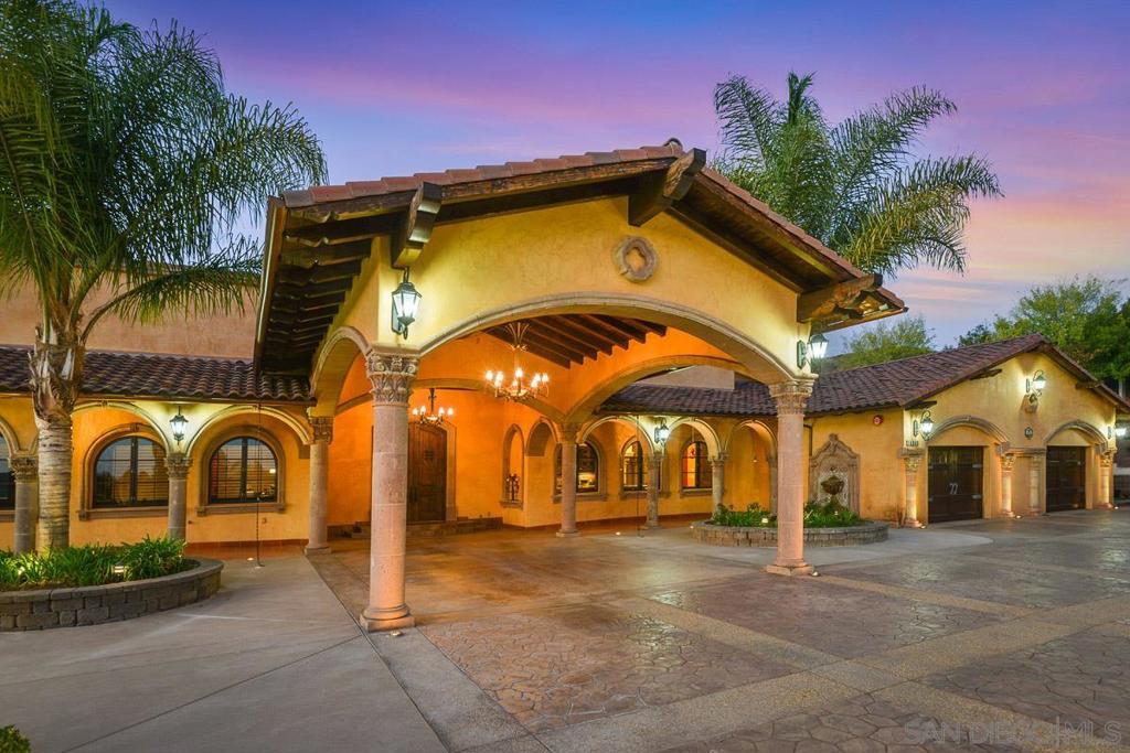 This unique Spanish-Mission hacienda was crafted to be both a beautiful, spacious home and a fully functional ranch. The design centers on grand scale and a connection to the outdoors. Inside, the ceilings create a sense of openness, with most rooms at 14 feet and the main living areas soaring to 20 feet. Some walls and ceilings have a hand-applied Venetian plaster finish, adding a subtle texture that catches the light and brightens each space. The nearly 7-acre property is as much a part of the home as the house itself. It includes a working bard of over 1000 sq ft, three stables for boarding, and a dedicated riding ring. Beyond the equestrian facilities, you'll find an orchard, coops and plenty of space for other activities. A pool and hot tub provide a peaceful spot to relax, making the property a true retreat. This is a rare chance to own a home where you can enjoy a comfortable, elegant lifestyle and a connection to the land.