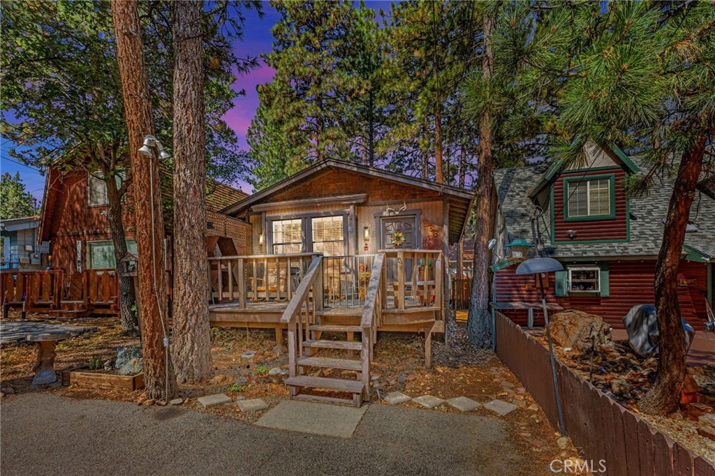 This rare gem perfectly blends cozy mountain character with thoughtful modern updates. Recently remodeled, the home features brand new laminate flooring, fresh interior paint, updated light fixtures, stylish knotty pine wood accents, and more... The renovated kitchen shines with new appliances and has been reconfigured to maximize space.
A second bathroom and convenient laundry room—hard-to-find features in this area—make this home ideal for both weekend getaways and full-time living. The spacious master bedroom offers a relaxing escape, while 1.5 baths provide comfort for family and guests. Outside, the long driveway offers ample parking for multiple vehicles, and the surrounding pine trees provide natural beauty, shade, and privacy.
Whether you’re searching for a part-time retreat or a full-time mountain home, this Sugarloaf treasure is ready to welcome you.