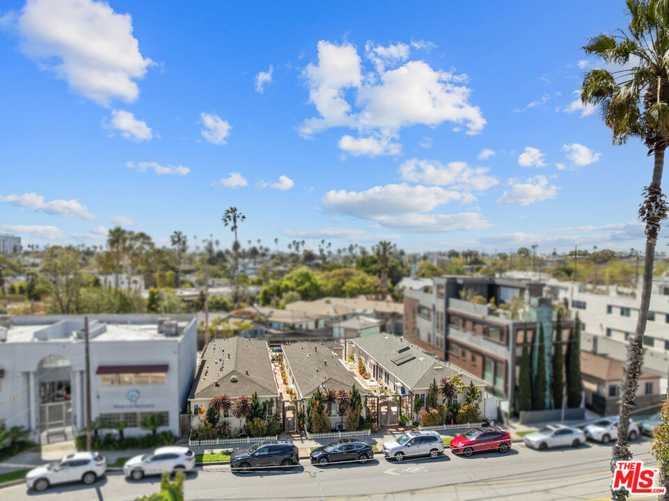 Rare Investment & Development Opportunity on Venice's Iconic Abbot Kinney Blvd. A truly one-of-a-kind opportunity to own a prime real estate on GQ magazines "the coolest block in America". This exceptional offering consists of three separate adjoining parcels (1722, 1724, 1726 Abbot Kinney) totaling over 9,000 square feet of land, featuring 12 units across three buildings (four units per building). This charming Venice compound includes 10 (1) bedroom/(1) bath units and 2 bachelors, all designed in a bungalow-style layout with beautiful adjoining courtyards. The property embodies the best of Venice living offering a serene and private atmosphere while being walking distance from the Venice Canals and Venice Beach, steps from the area's top dining (Felix, Gjelina, Great White, Scopa), Erewhon, Abbot Kinney's "First Fridays", bars, the local Farmer's Market and entertainment. With six one-car garages and four additional open parking spaces, this property provides rare and ample parking for residents and guests alike. Even more compelling, the property is zoned LAC2 (Commercial Retail), unlocking massive long-term upside for future development in this A+ location. All three parcels are being sold together as a package, but will be transferred separately by parcel. Whether you're an investor looking for strong rental income, a developer seeking prime real estate, or an owner-user envisioning the possibilities, this is an unparalleled chance to secure a trophy asset in the heart of Venice.