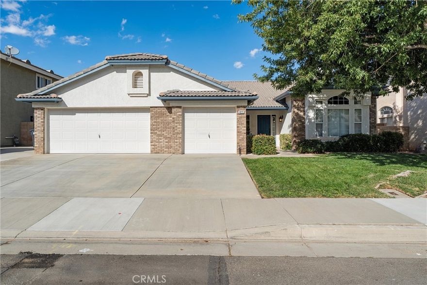Wait till you see this immaculate Ranch Vista home. Home has been so well cared for over the years you wont believe your eyes. The home is located in the heart of Rancho Vista and is within walking distance to the elementary and middle school. Has 4 bedrooms and 2 full baths. Formal living room, family room with beautiful brick fireplace with vaulted ceiling. Kitchen has tiled counters, breakfast bar, refrigerator and appliances. Master suite overlooking backyard with a private entrance to the master. Master bath with tiled counters, dual sinks, separate garden tub and shower and a walk in closet. All large secondary bedrooms. Fully landscaped front and rear with brick planters and a full length patio. Large 3 car finished garage.