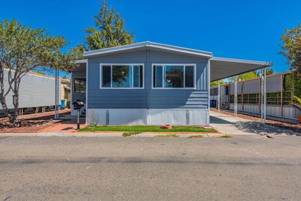 Discover this beautifully updated home featuring stylish new laminate flooring and fresh exterior and interior paint that enhances its unique charm. This 2 bed, 2 bath home boasts brand new double paned windows, modern grey cabinets in both the kitchen and bathrooms, quartz countertops and modern hardware. Additional upgrades include Brand new kitchen appliances and tile backsplash. Venture towards the primary bedroom, which includes a sliding door closet and an ensuite with a shower over tub. The second bedroom is a comfortable size with ample closet space. An added bonus is a large screen room that can easily be turned into a home office, hobby room, or additional living space. Large backyard, and the home is close to guest parking. The roof has been redone and all Section 1 Termite has been completed. This Family All- Age Community is near shopping centers, close to schools, easy access to Hwy 880/92 San Mateo Bridge, 84 Dumbarton Bridge and near Bart Station