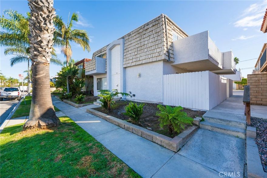 Just 4 Short Blocks to the Beach!  3 Bedrooms, 2 and Half Bathrooms, Townhouse Style Condo located on 22nd Street in Downtown Huntington Beach.  This home has great open Indoor and Outdoor Space in addition to the generous 1750 sq ft of Living Space.  Newer Hardwood Laminate Flooring throughout.  Freshly Painted. Cozy, Gas/Wood burning Fireplace in Living Room.  Spacious and Open Kitchen and Dining area. Kitchen is equipped with Gas range/oven for those who Love to Cook. All Bathrooms have Granite Counter Tops. Each of the Bedrooms upstairs has Balcony Access with white French Doors~ And, Another Large Patio off of Kitchen and Dining Area.  Includes 2-Car Detached Garage, and it is easy to find Street Parking on this Quiet End of Activity-filled, Downtown Huntington Beach. This is an Amazing Location at an Affordable Price for All the Beach Lovers surrounded by Multi-Million Dollar homes.  Just down the street from Award-Winning Huntington Beach Public Schools: Smith Elementary, Dwyer Middle and Huntington Beach High School.