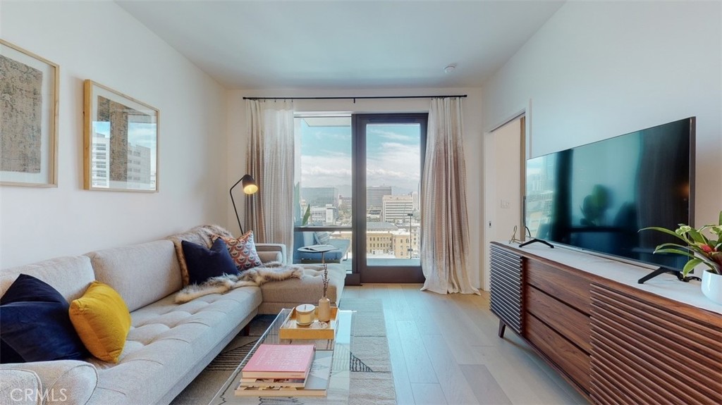 Experience Elevated Living at Perla on Broadway | DTLA's Premier Luxury High-Rise
Welcome to this exquisite one-bedroom, one-bathroom residence located high above the city on the 15th floor of Perla on Broadway—Downtown LA's most exciting new luxury vertical community. Nestled in the heart of the Historic Core, this impeccably designed unit offers an unparalleled lifestyle with sweeping views of the DTLA skyline, Hollywood Hills, and vibrant cityscape—best enjoyed from your own private 142 sq. ft. balcony or while you're perched on top of the panoramic roof deck. Inside, you’ll find an open-concept floor plan featuring floor-to-ceiling windows that flood the space with natural light, complemented by a professionally designed interior living area. The modern kitchen is a chef’s dream, outfitted with Bertazzoni stainless steel gas range, polished quartz countertops, full-height porcelain tile backsplash, custom European cabinetry, and soft-close drawers. The spa-like bathroom includes a deep soaking tub, Kohler fixtures, and elegant designer-selected finishes.
Additional features include:
• Wide-plank European white oak flooring
• Pre-wired for high-speed fiber optic internet
• Bosch in-unit washer/dryer
• Assigned parking with EV charger
Perla offers over 49,000 square feet of resort-style amenities, including:
• Pool deck and spa with panoramic city views
• State-of-the-art fitness center (periodic yoga and spin classes)
• Rooftop lounge, fire pits, outdoor BBQs & dining areas
• Four-story light-filled atrium with curated social spaces
• Private theater, game room with pool table and ping pong, media room & co-working lounges
• Stylish wine tasting room, chef’s kitchen & private dining space
• Two dog runs, professional pet spa & tranquil garden terrace
• 24-hour concierge, security, and controlled gate access
Just steps from iconic destinations such as Grand Central Market, the Bradbury Building, Pershing Square, Walt Disney Concert Hall, MOCA, and the Regent Theater, this home puts the best of LA at your doorstep. With nearby Metro access and the upcoming UCLA DTLA campus, connectivity is seamless.
Whether you're seeking a refined urban retreat, a stylish live/workspace, or an investment in one of LA’s fastest-growing neighborhoods, this exceptional residence delivers luxury, lifestyle, and location.