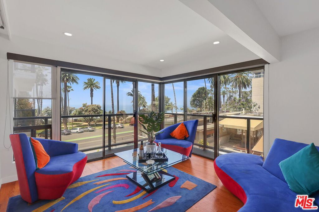 Spectacular Ocean View Penthouse with Private Sundeck | Experience the pinnacle of beachfront living in this exceptional two-level penthouse on prestigious Ocean Avenue. This sophisticated residence captures breathtaking panoramic ocean views from the main living spaces, transforming daily sunsets into your personal theater. The expansive open-concept main level seamlessly integrates living, dining, and kitchen spaces, all oriented to maximize the spectacular Pacific vistas. Floor-to-ceiling windows flood the interior with natural light while framing endless ocean horizons. Step out onto your private sundeck to entertain al fresco or simply bask in the coastal ambiance. Ascend to the versatile loft level, featuring its own private deck--an ideal retreat for a home office, artist's studio, or third bedroom suite. This unique two-story layout offers both sophisticated entertaining spaces and intimate privacy rarely found in beachfront properties. Additional luxury features include generous closet space throughout, in-unit laundry, and two coveted side-by-side parking spaces. Located directly across from Palisades Park, you'll enjoy immediate access to the beach path, Montana Avenue's world-class dining and shopping, and the iconic Santa Monica Pier--all while residing in one of Ocean Avenue's most sought-after boutique buildings. This is coastal California living at its absolute finest.