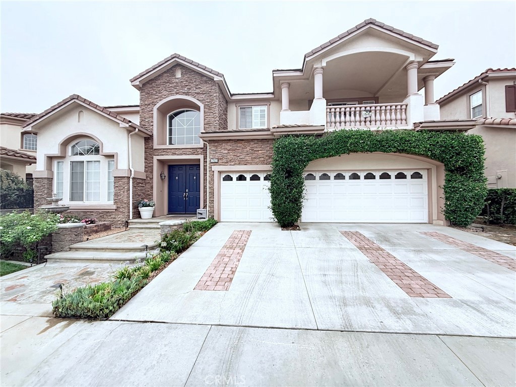 Exceptional single-family home in the prestigious Vista Verde community of Yorba Linda, where luxury living meets breathtaking views.
Set on a generous 9,440 sq. ft. lot, this stunning 3,785 sq. ft. residence offers 4 spacious bedrooms, 3.5 bathrooms, a versatile loft perfect for a game room, a convenient downstairs office (optional 5th bedroom), and a luxurious downstairs master suite.
As you enter, an open-concept floor plan invites you in, seamlessly connecting the living spaces. The welcoming family room flows effortlessly to the backyard oasis, where you’ll enjoy sweeping city views — and even catch the magical Disneyland fireworks lighting up the night sky. The outdoor retreat features a relaxing spa and built-in BBQ, ideal for both intimate gatherings and lively entertaining.
For golf enthusiasts, the renowned Black Gold Golf Course is just minutes away. The fully upgraded kitchen is a chef’s dream, boasting granite countertops, sleek white cabinetry, and high-end appliances for effortless meal preparation.
Families will appreciate the home’s location in one of Yorba Linda’s top-rated school districts, with Heritage Oak Private School and the public library only minutes away. This rare combination of comfort, elegance, and location ensures access to exceptional education, community resources, and leisure activities.
Experience the best of Southern California living in Vista Verde — a home that offers panoramic cityscapes, world-class amenities, a generous lot, and the nightly sparkle of Disneyland’s fireworks for a truly enchanting lifestyle.