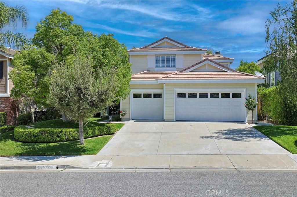 Step into this stunningly remodeled Warmington Plan I with 4 bedrooms, 3 bathrooms and a bonus room off the primary bedroom, perfect for a baby nursery or home office. Located in the highly sought after area community of Northbridge in Valencia, on a quiet cul-de-sac with quick access to the beautiful paseos leading to the community pools and tennis courts, Helmer’s Park and award winning Charles Helmers Elementary. Relax in your low maintenance backyard which was designed for entertaining with a built-in bar, BBQ, refrigerator, fire pit and lighting. In addition to palm trees, there is an apricot and apple tree for you to harvest fruit from each year. Sellers have recently updated the home with modern finishes including fresh paint inside and out, new flooring, updated bathrooms, new stove top, microwave and water heater. The large three car garage offers an over abundance of storage with custom cabinetry, built-in shelving and a loft for larger items. Additional upgrades include newer roof, garage door opener, interior lighting and the backyard is pre-wired for a hot tub. This beautiful home is move-in ready and waiting for you to enjoy all of the recent upgrades and wonderful community amenities. Welcome home to 23609 Wilmington Court!