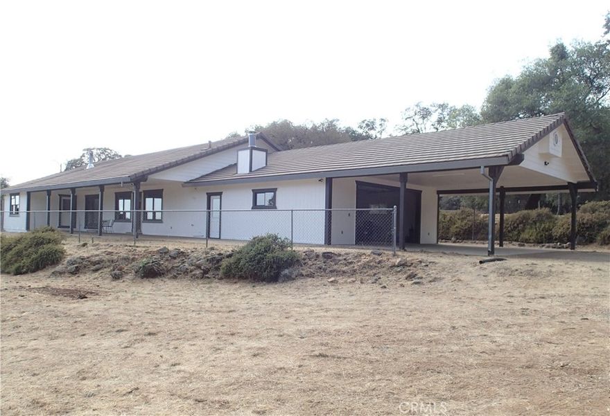 Welcome to your own slice of country paradise! Situated on just under 10 acres, this beautiful 3-bedroom, 2.5-bath home offers the perfect balance of privacy and convenience—nestled in a quiet, rural setting, yet just off the pavement for easy year-round access. Inside you'll find freshly updated interior with brand-new carpet, new paint throughout, new ceiling fans, lighting and switches, and all-new appliances in the open-concept kitchen that flows seamlessly into the spacious living room, ideal for entertaining or relaxing with friends or family. And the expansive covered patios let you enjoy  sunset views and on a clear day see all the way to Sacramento. 

The expansive and mostly level, gated and private, property is perfectly equipped for livestock, featuring a barn, fenced areas, ample space to roam, and the possibility of irrigation water from SFW&P (buyer to investigate). An oversized garage provides extra room for vehicles, tools, or hobbies.   Whether you're looking for a hobby farm, a peaceful homestead, or just room to breathe, this move-in-ready property offers endless potential in a truly scenic and private setting.