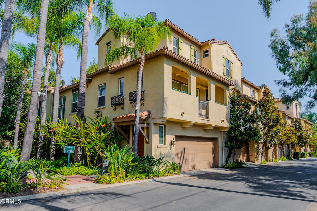 This beautifully designed end-unit townhome offers exceptional privacy and convenience, featuring an attached side-by-side 2-car garage and no shared walls on the bedroom level. The main level showcases warm hardwood floors, abundant natural light streaming through oversized windows, a cozy gas fireplace, and a balcony perfect for enjoying fresh air and sunset views. The dining area, set beside the living room, captures treetops views, while the gourmet kitchen impresses with brand-new quartz countertops, a breakfast bar, and Viking professional stove and refrigerator. A stylish powder room completes the main floor, making entertaining a breeze. Upstairs, the spacious primary suite features breathtaking mountain views, a walk-in closet, and a private ensuite bath. The second bedroom also enjoys its own ensuite, ensuring comfort for family or guests. Laundry hookups, complete with a stackable washer and dryer, add everyday convenience. Nestled in a prime interior location within the complex, the home is surrounded by meticulously maintained park-like grounds, accented with charming fountains, inviting sitting areas, and a gated driveway for peace of mind. Centrally located with easy freeway access, close to Metro stations, universities, and shopping.