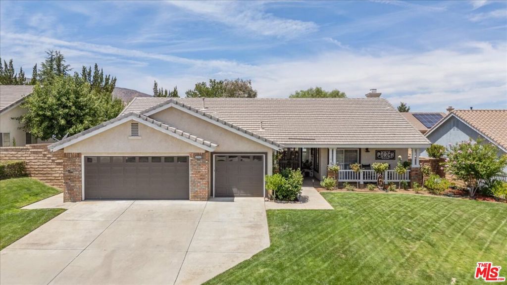 ~ BEAUTIFULLY ~ Maintained 4-bedroom, 2-bathroom single-story home located in one of the area's most sought-after neighborhoods. This inviting residence offers a perfect blend of comfort, style, and convenience. Step inside to find a spacious open floor plan with abundant natural light, ideal for both everyday living and entertainment. The kitchen has a Breakfast Nook w/ A Sliding Door Leading To The Front Porch, a Center Island, Pendant Lighting, Barstool Seating, And Opens Up To The Family Room w/ A Cozy Fireplace. Primary suite boasts a private ensuite bath and generous closet space, while three additional bedrooms offer flexibility for guests, a home office, or growing families. Outside, enjoy a beautifully landscaped yard perfect for relaxing evenings or weekend gatherings. With excellent curb appeal, a two-car garage, and close proximity to top-rated schools, parks, shopping, and dining, this home checks every box. Don't miss your chance to own this gem in a prime location schedule your private tour today!!!