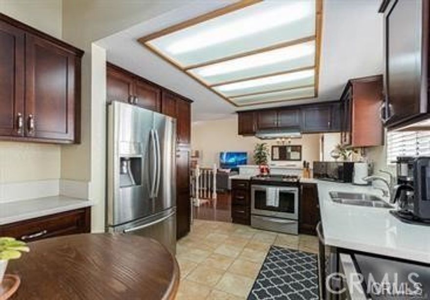 Welcome to this beautiful 2-story North Redondo Beach Townhome with a bright open floorplan. Including; Mahogany hardwood flooring that starts at the stairway and continues through to the living room that is on the second floor. The living room and master bedroom have cathedral ceilings. New engineered Oak Driftwood flooring is in all three bedrooms. New tile is in the downstairs hallway, kitchen, bathrooms and laundry room. There are new blinds throughout the home. The kitchen has upgraded cabinets, counter tops and stainless steel appliances. Huge master bedroom includes recessed lighting, custom builtin closet cabinets and new closet doors. The master bathroom has a soaking tub and skylight. Direct access to the 2-car garage that includes plenty of storage space. In addition to the balcony patio area on the second floor, there is a small yard off of the garage that is perfect for a pet and BBQing. This location is close to restaurants, grocery stores, retail stores and transportation with the beach only 2 miles away and LAX only 5 miles away.